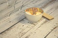 Ice cream in a glass bowl with decorative topping and waffles, lie on a wooden table. Close-up Royalty Free Stock Photo