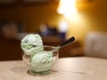 Ice cream in glass dish with spoon. Delicious mint chocolate chip Royalty Free Stock Photo
