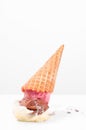 Ice cream on the ground. Ice cream cone dropped on floor Royalty Free Stock Photo