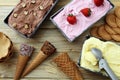 Ice cream handmade in with waffle and wafer trays background