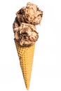 Real comestible ice cream:  hazelnut and chocolate ice cream cornet isolated on white background Royalty Free Stock Photo