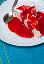 Ice cream meringue cake with strawberry topping Royalty Free Stock Photo