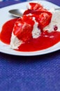 Ice cream meringue cake with strawberry topping Royalty Free Stock Photo