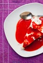 Ice cream meringue cake with strawberry topping Royalty Free Stock Photo