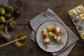 Ice cream pops made with fresh figs on a rustic wooden background. Summer lifestyle. Preparing healthy dessert. Homemade product.