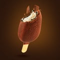 Ice cream popsicle with chocolatey coating on brown background