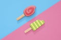 Ice Cream Popsicles Lollipops on pink and blue pastel background Royalty Free Stock Photo