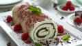 ice cream roll with chocolate curls and mint leaves on top and raspberries, on a white plate, poster Royalty Free Stock Photo