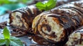 ice cream roll with chocolate curls and mint leaves on top, on a wooden board, banner Royalty Free Stock Photo