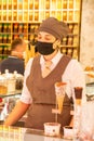 Ice cream saleswoman with protective mask