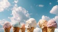 Ice cream scoop cones in front of blue sky. Summer holiday fresh frozen dessert in waffle cone. Vanilla white cream with