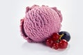 Ice cream scoop with redcurrant and blueberry Royalty Free Stock Photo