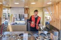 An ice cream seller, dressed in traditional Turkish costume