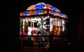 ICE CREAM SELLER AT NIGHT NEAR A PARK WAITING FOR BUYERS