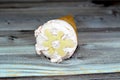 Ice-cream of special flavors in crispy wafer cones, melting cold ice cream twirl in a wafer biscuits isolated on wooden background