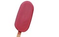 ice cream on a stick with ruby chocolate isolated on a white background, horizontal banner mockup copy space Royalty Free Stock Photo