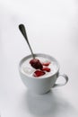 Ice cream with strawberries in a cup on the table Royalty Free Stock Photo