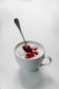 Ice cream with strawberries in a cup on the table Royalty Free Stock Photo