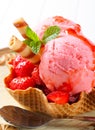 Ice cream with strawberries in wafer bowl Royalty Free Stock Photo