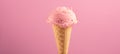 Ice cream. Strawberry or raspberry flavor icecream in waffle cone over pink background. Sweet dessert