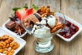 Ice cream sundae, chocolate, walnuts, sliced strawberry and jam Royalty Free Stock Photo