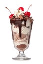Ice cream sundae, dripping with rich chocolate sauce, with red cherries and chocolate chunks on top, isolated on white background
