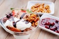 Ice cream sundae, walnuts and jam Royalty Free Stock Photo