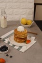 Ice Cream Topping Pancakes with Blueberries on a plate. Blurred Top view Royalty Free Stock Photo