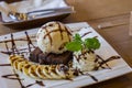Ice cream vanila and chocolate souce banana dessert Royalty Free Stock Photo