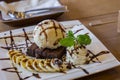 Ice cream vanila and chocolate souce banana dessert