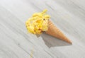 Ice cream in a waffle cone fell on floor Royalty Free Stock Photo