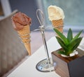 Ice cream waffle sugar cones in metal holder on the table Royalty Free Stock Photo