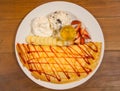 Ice creame crape with strawberry sauce and banana