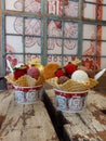 Ice creams with strawberries in a waffle cup on a table in an ice cream shop in Taichung, Taiwan