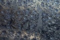 Ice crystals on a window, close-up