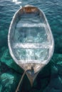 An ice cube in a boat floating on the sea. Ice in a boat in the ocean Royalty Free Stock Photo