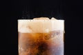 Ice cube in fizzy splashing water with soda Royalty Free Stock Photo