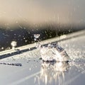 Ice Cube Impact Creates a Liquid Crown Splash Royalty Free Stock Photo