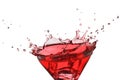 Ice-cube splash in a red liquid isolated Royalty Free Stock Photo