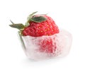 Ice cube with strawberry on white background