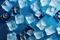 Ice cubes on blue background. Top view. Generative AI Royalty Free Stock Photo