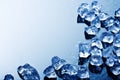 Ice cubes in blue light Royalty Free Stock Photo