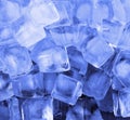 Ice cubes in blue light Royalty Free Stock Photo