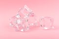 Ice cubes close up on rose background Royalty Free Stock Photo