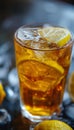 Ice cubes in cold ice tea with lemon slices. AI generated. Royalty Free Stock Photo