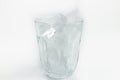 Ice cubes in glass isolated on white background, shallow depth of field Royalty Free Stock Photo