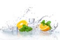 Ice cubes, mint leaves with oranges