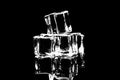 ice cubes on reflection table on black background Royalty Free Stock Photo