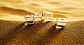 Ice Cubes on Sandy Surface Under Warm Golden Light for Refreshment and Cooling Concept Royalty Free Stock Photo