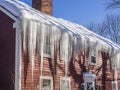 Ice dams and snow on roof and gutters Royalty Free Stock Photo